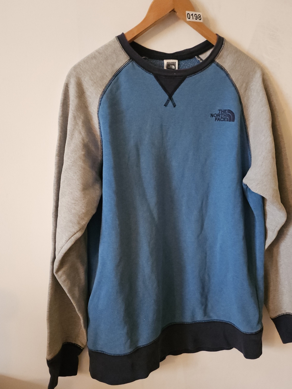 The North Face Blue Crewneck Sweatshirt with Gray Raglan Sleeves
